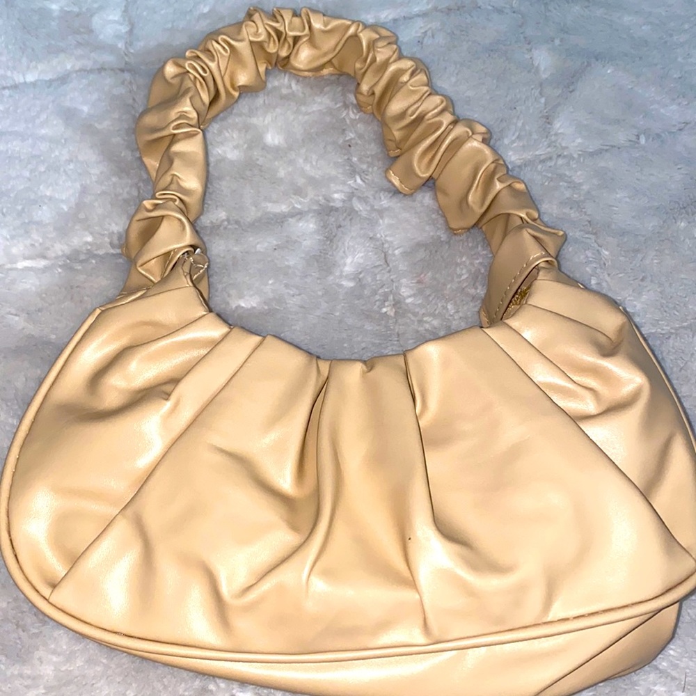 Nude small clutch bag
